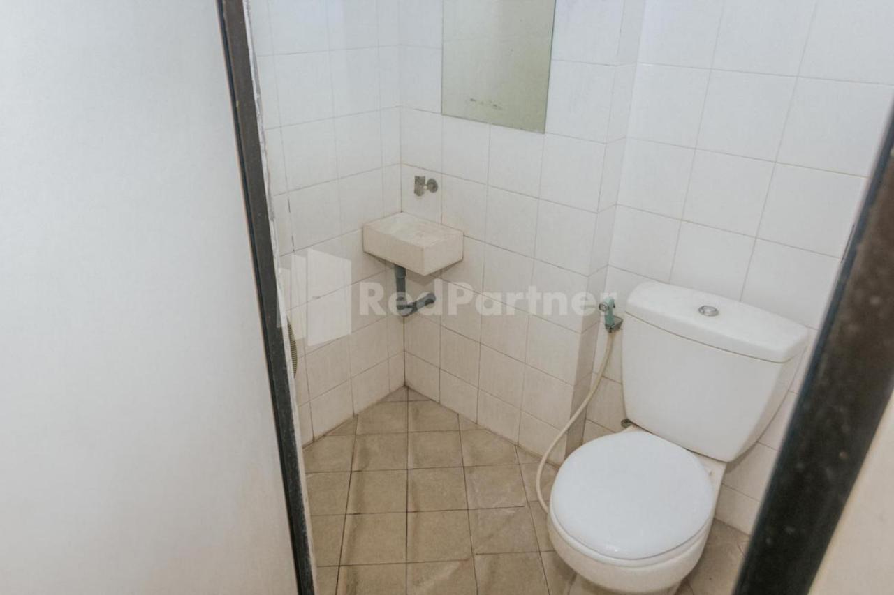 Отель De Lugano Scbd Syariah Mitra Reddoorz Джакарта Экстерьер фото