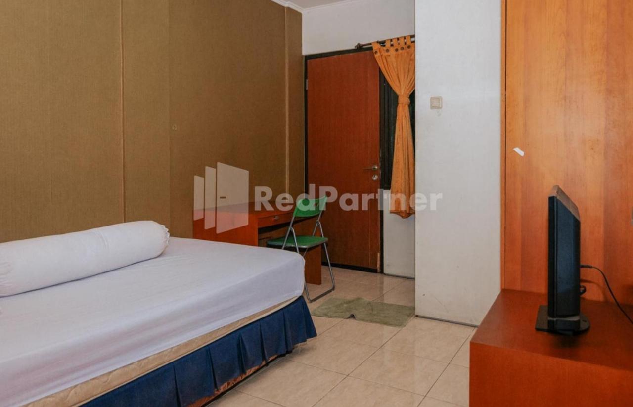 Отель De Lugano Scbd Syariah Mitra Reddoorz Джакарта Экстерьер фото